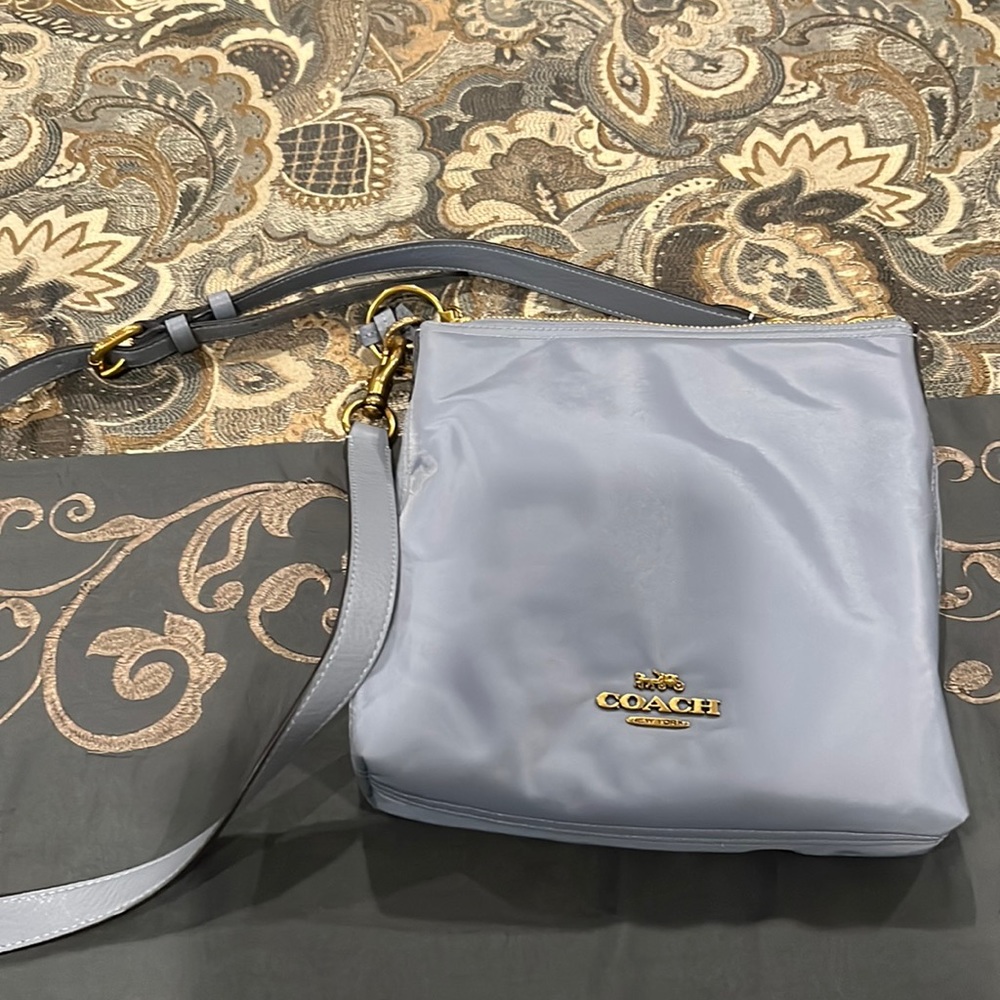 Light blue Coach cross body bag